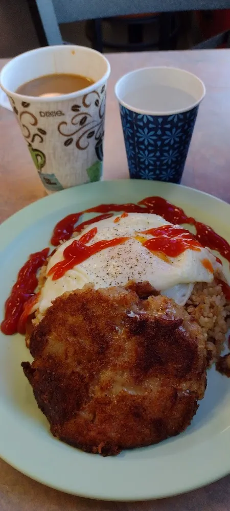 Corned Beef Hash Patty 2 Eggs over Easy Fried Rice Coffee and Water